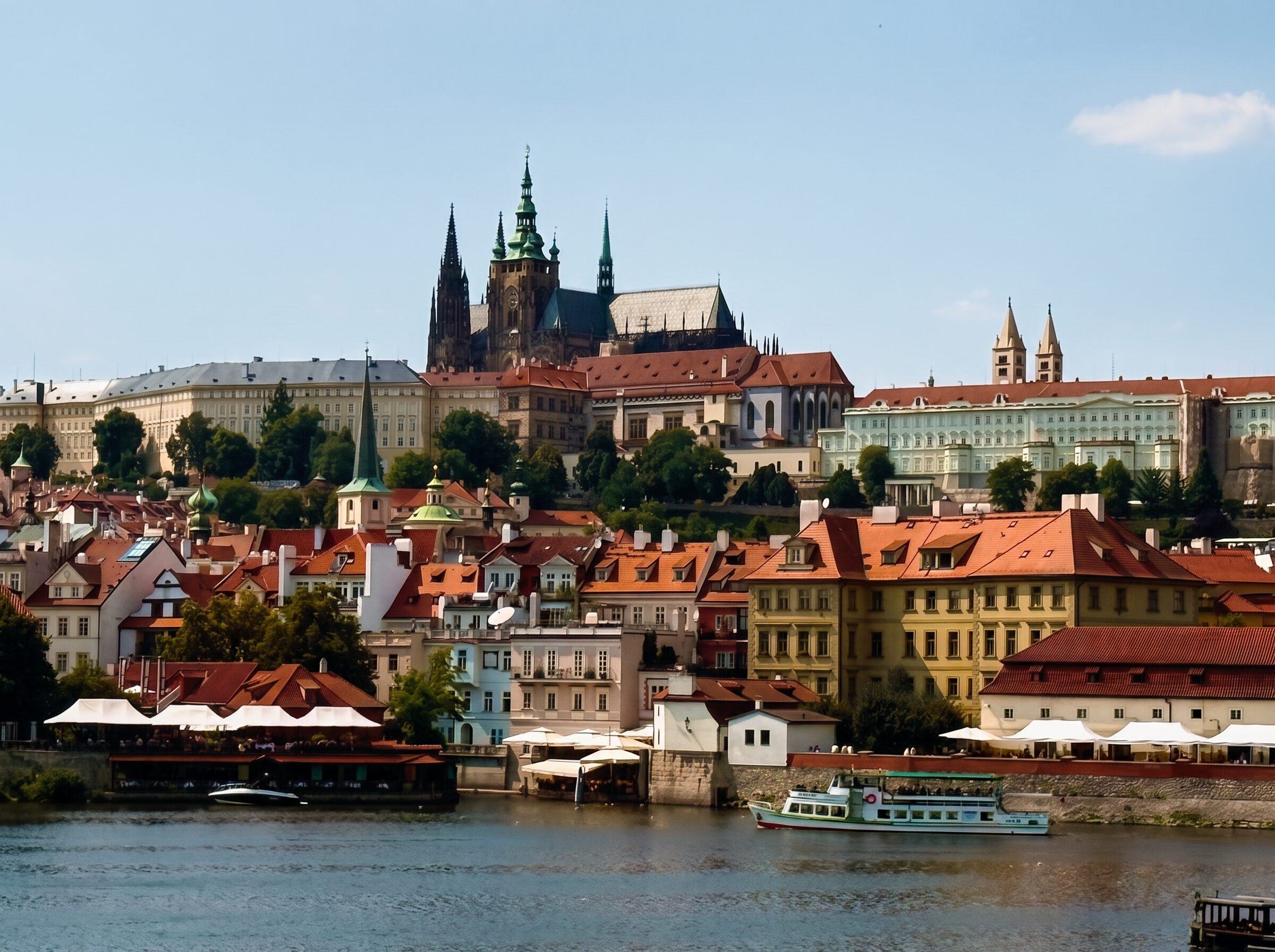 View of Prague Castle, St. Vitus Cathedral and Lesser Town across the Vltava river